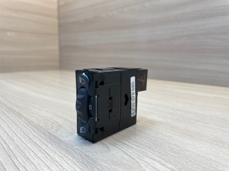 Кнопка корректора фар