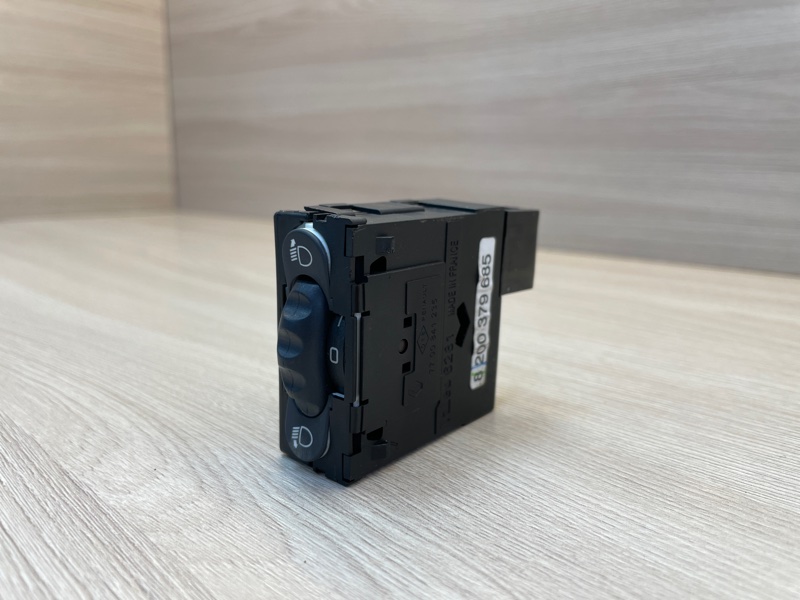 Кнопка корректора фар