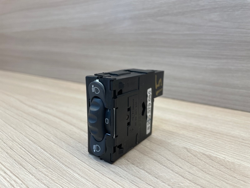 Кнопка корректора фар