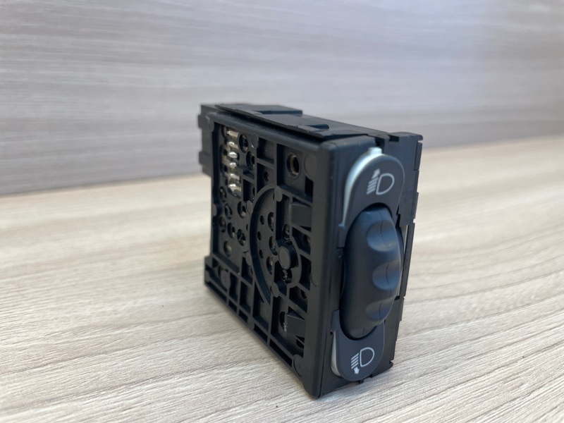 Кнопка корректора фар