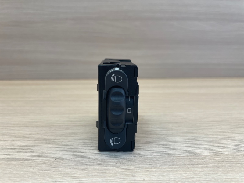 Кнопка корректора фар