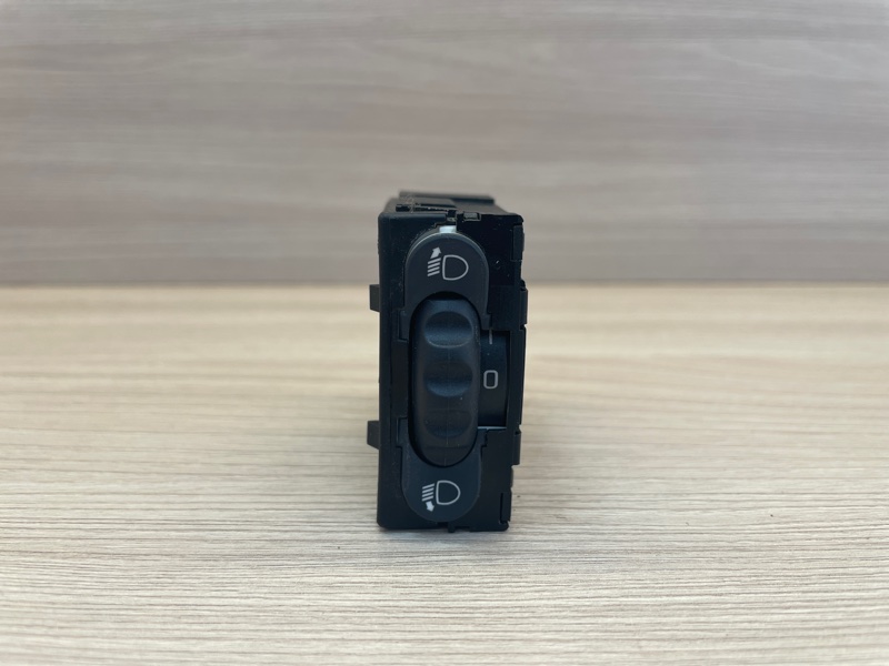 Кнопка корректора фар