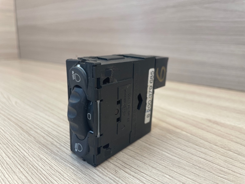 Кнопка корректора фар