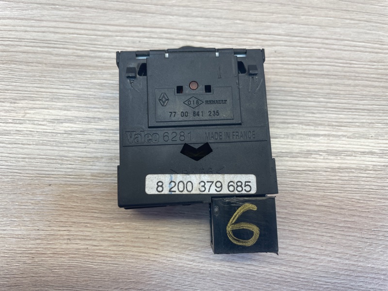 Кнопка корректора фар