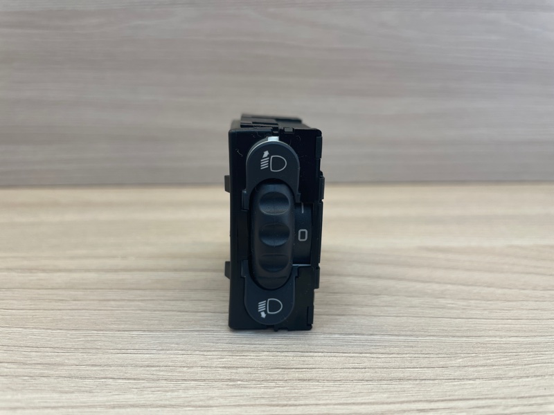 Кнопка корректора фар