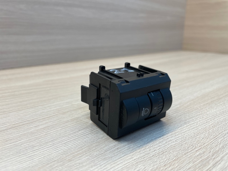 Кнопка корректора фар