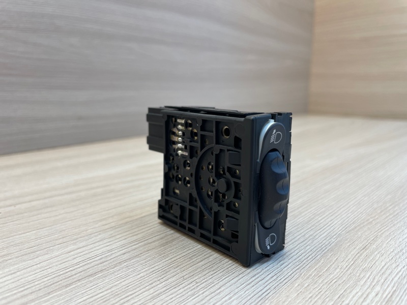 Кнопка корректора фар