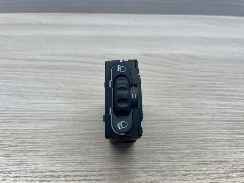 Кнопка корректора фар