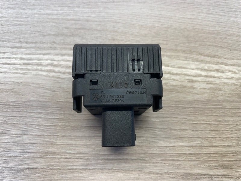 Кнопка корректора фар