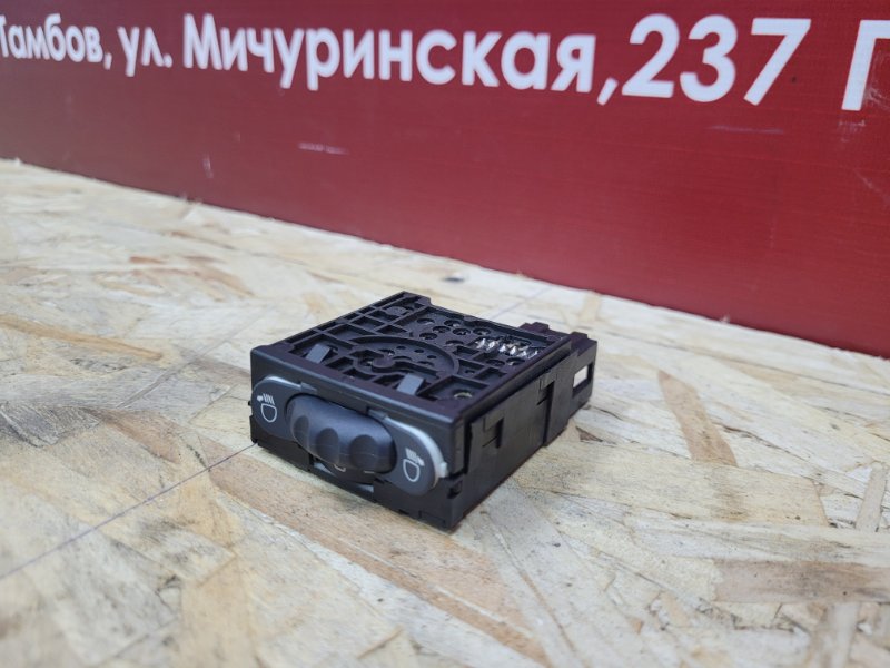 Кнопка корректора фар