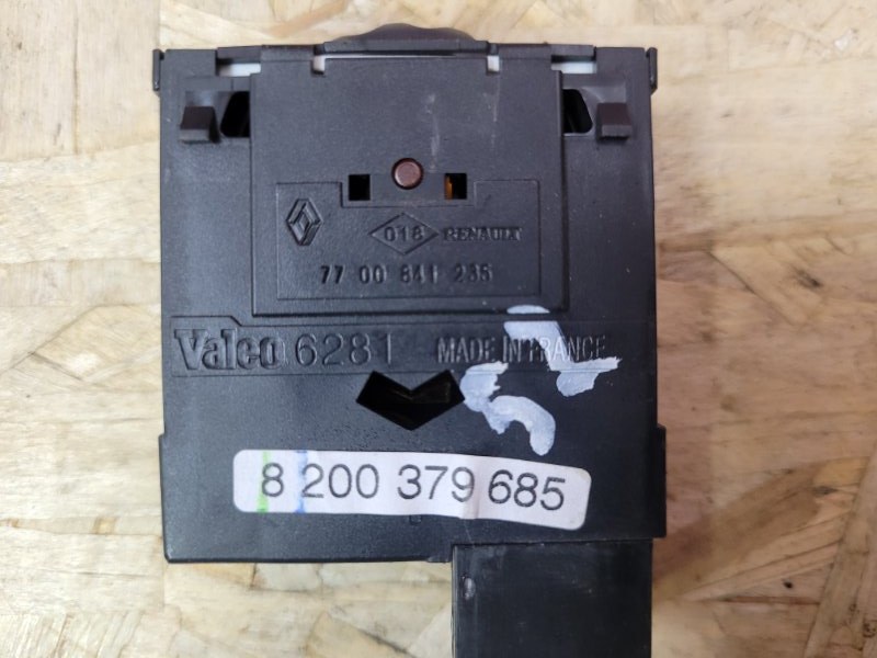 Кнопка корректора фар