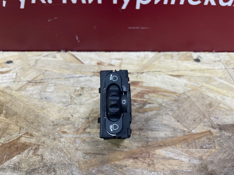 Кнопка корректора фар