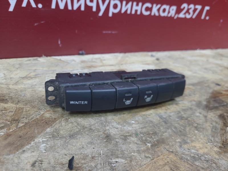 Кнопка обогрева сидений