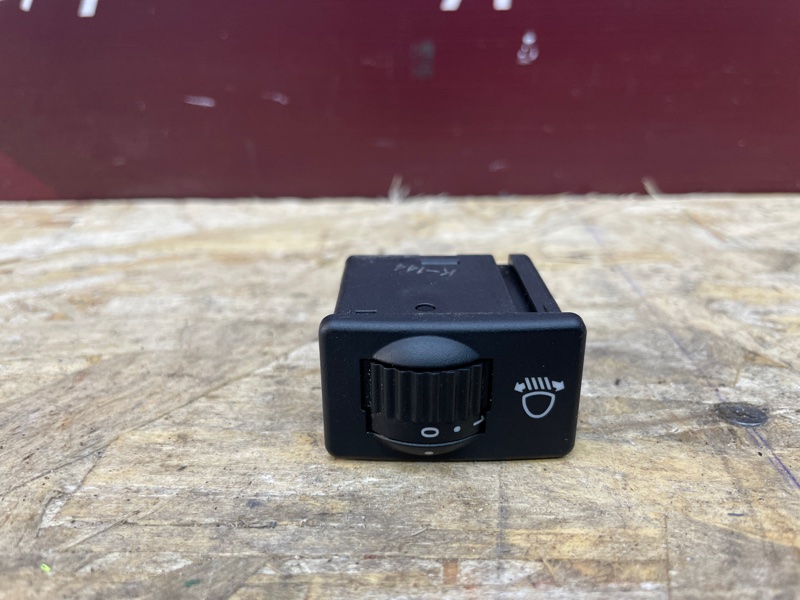 Кнопка корректора фар