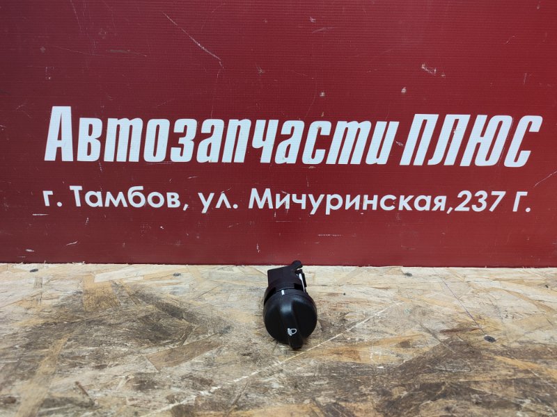 Кнопка корректора фар