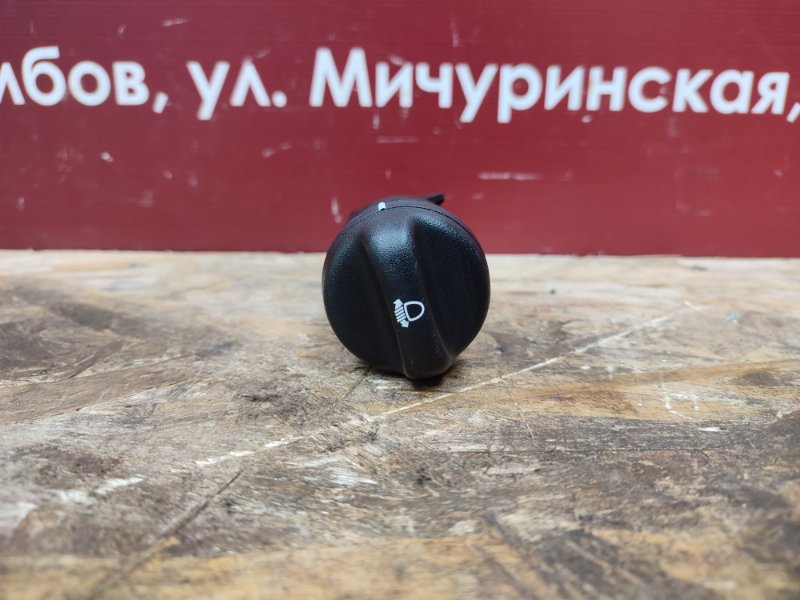 Кнопка корректора фар