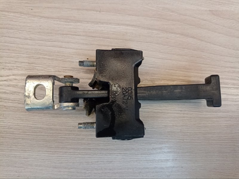 Ограничитель двери