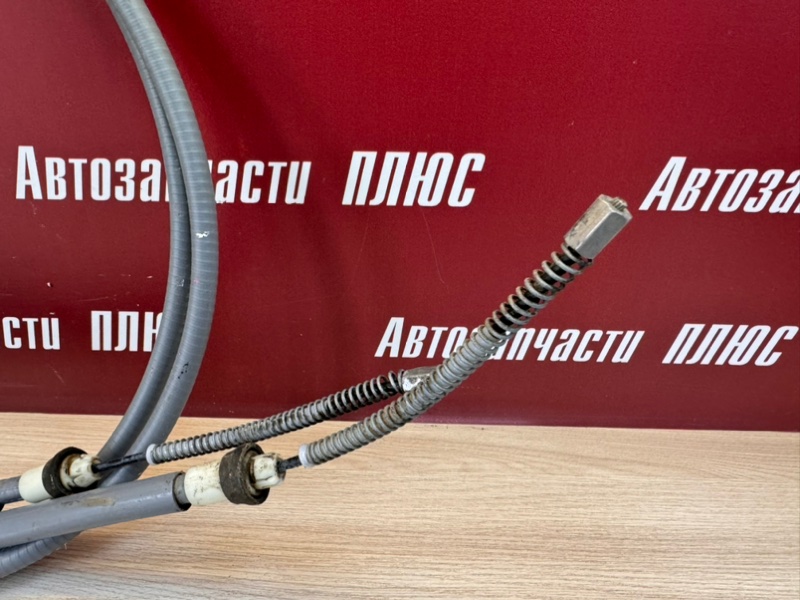 Трос стояночного тормоза