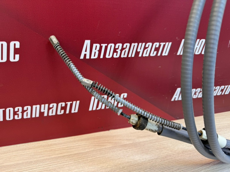 Трос стояночного тормоза