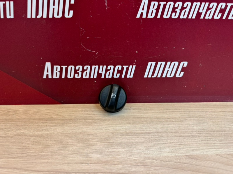 Кнопка корректора фар