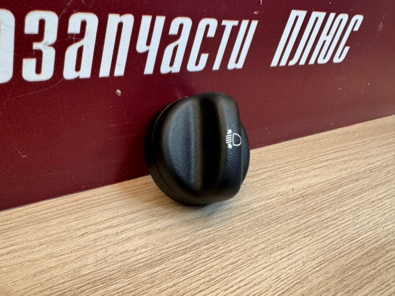 Кнопка корректора фар