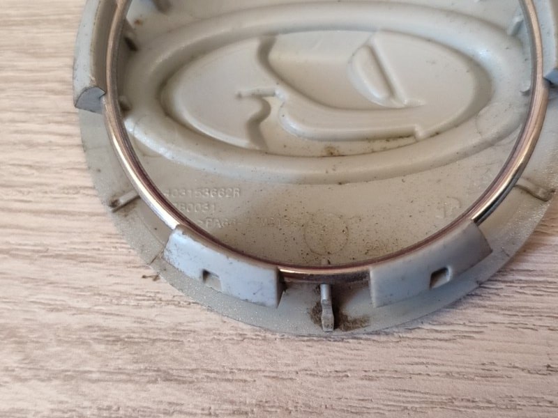 Колпак колеса центральный