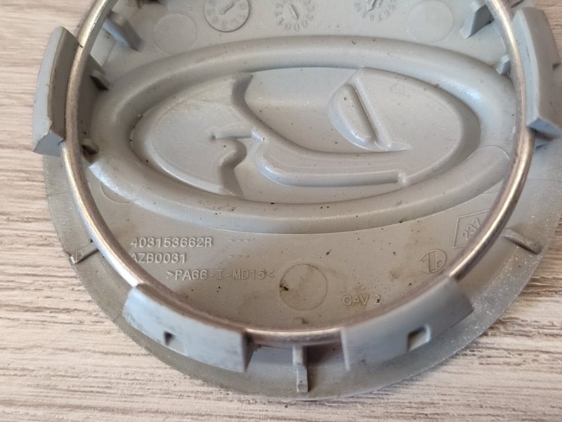 Колпак колеса центральный