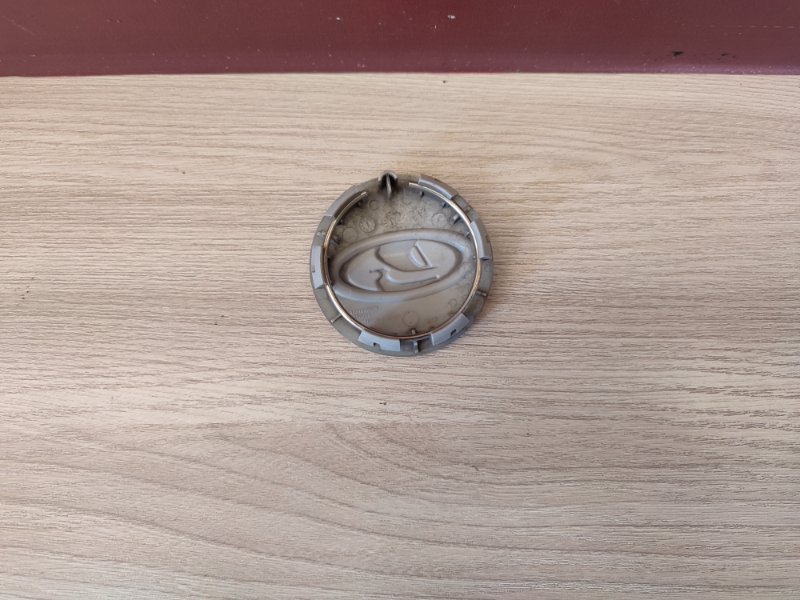 Колпак колеса центральный