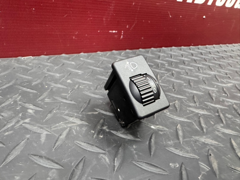 Кнопка корректора фар