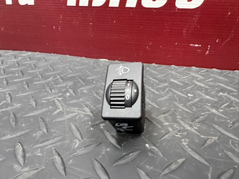 Кнопка корректора фар