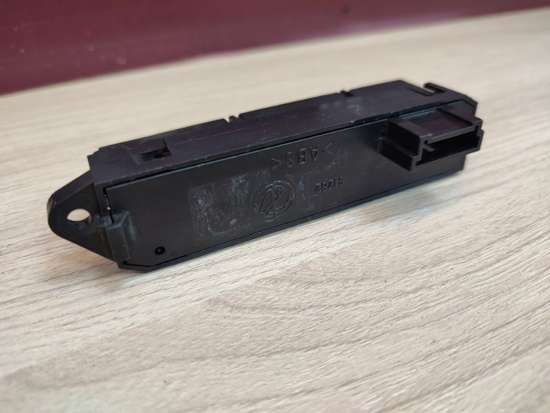 Кнопка корректора фар