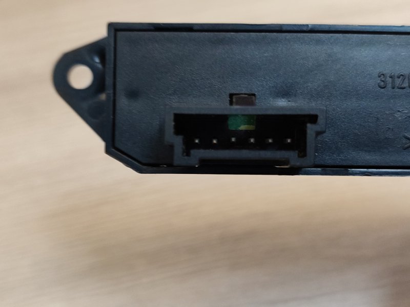 Кнопка корректора фар