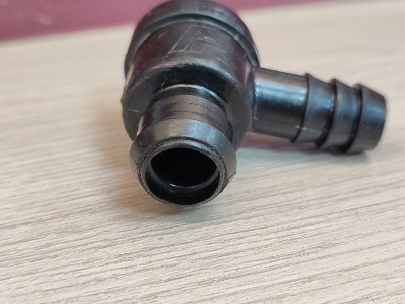 Клапан вакуумный