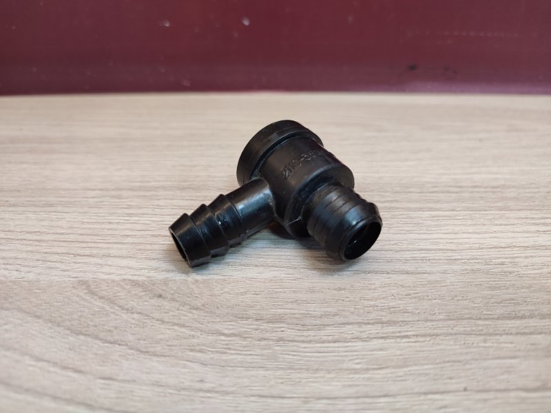 Клапан вакуумный