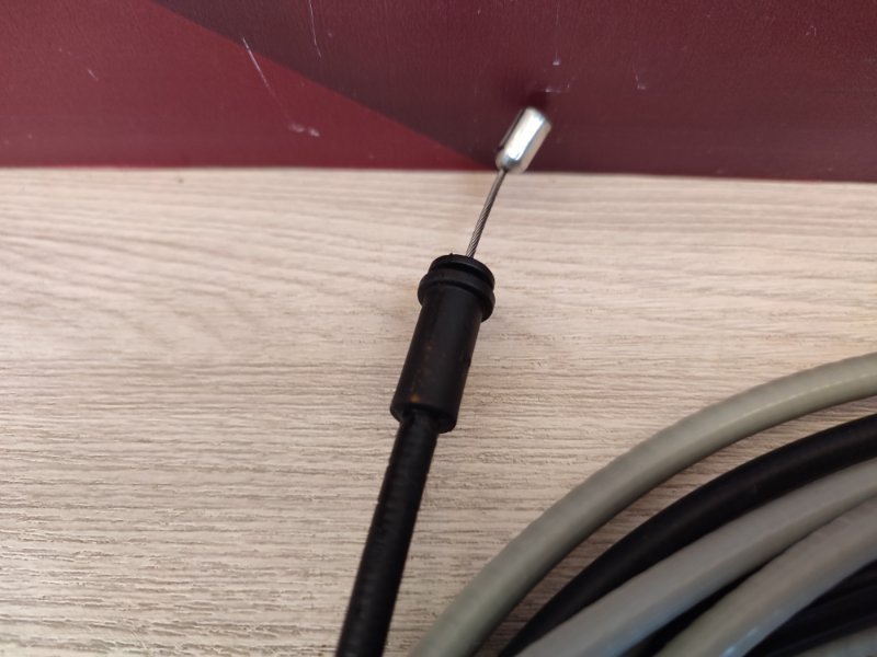 Трос замка капота