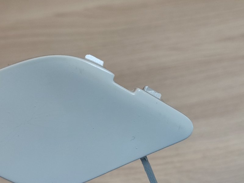 Заглушка буксировочного крюка