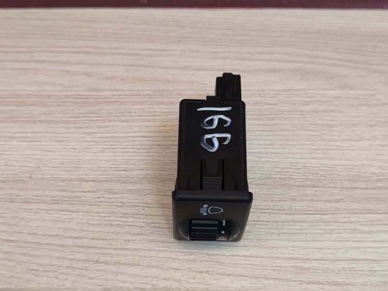 Кнопка корректора фар