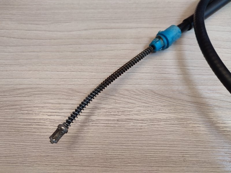 Трос стояночного тормоза