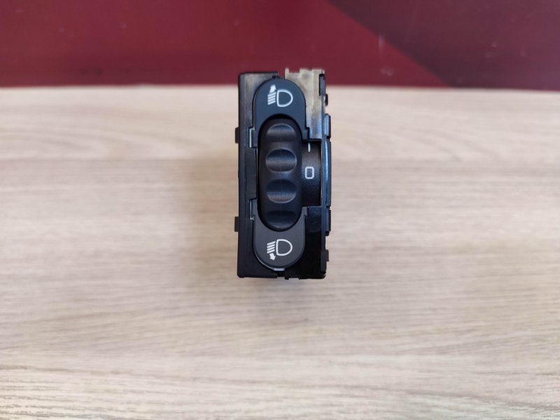 Кнопка корректора фар