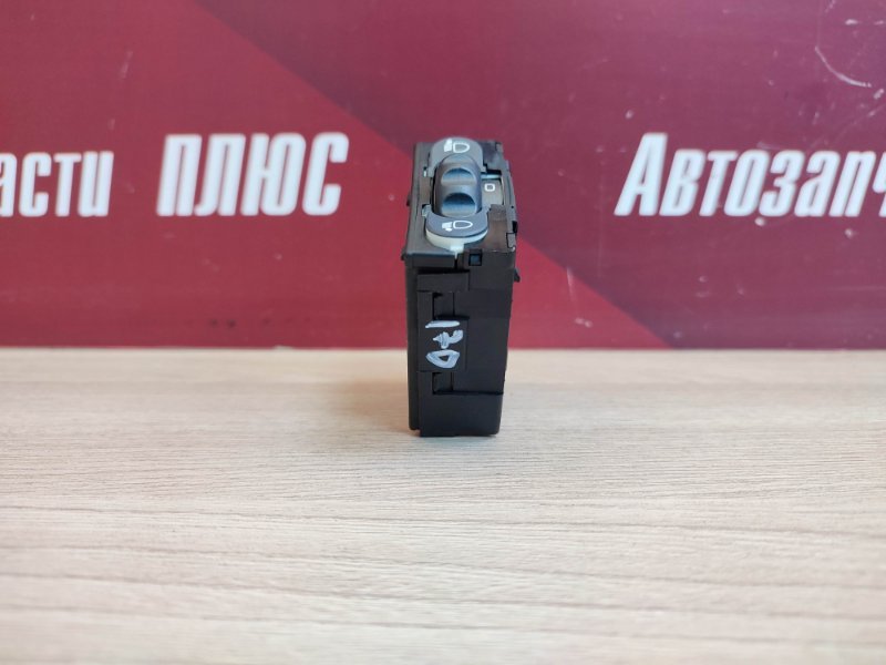 Кнопка корректора фар