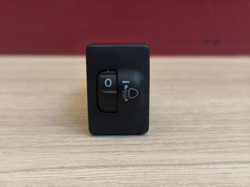 Кнопка корректора фар