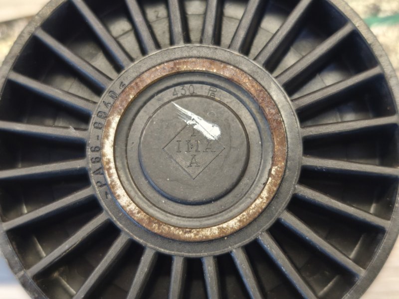 Ролик натяжной