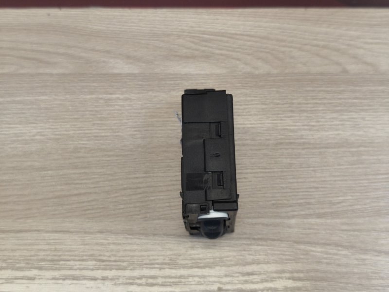 Кнопка корректора фар