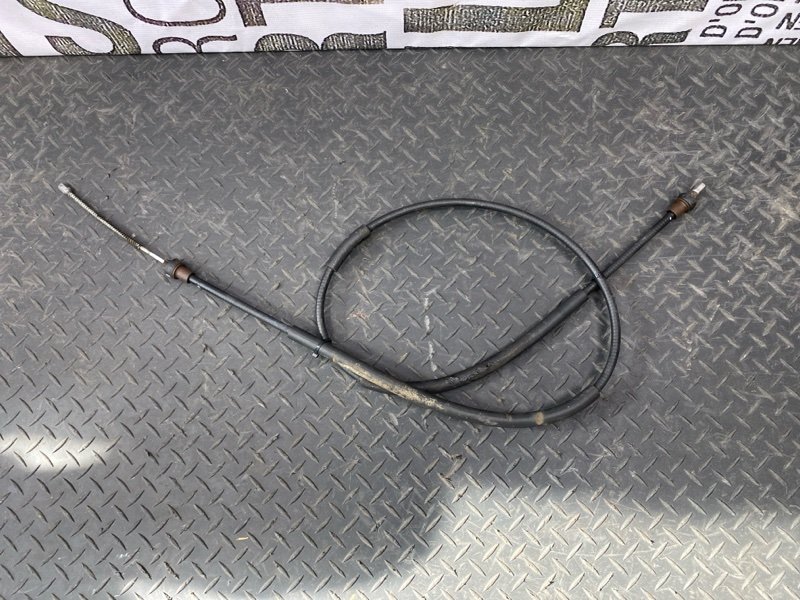 Трос стояночного тормоза