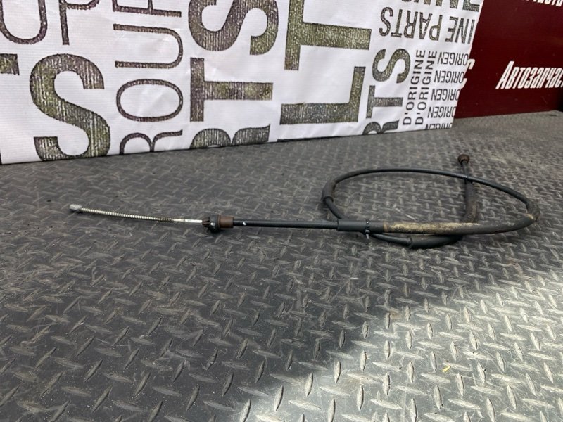 Трос стояночного тормоза