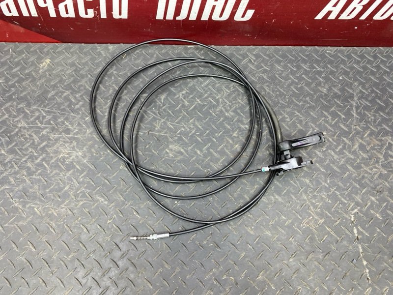 Трос лючка топливного бака