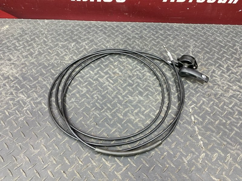 Трос лючка топливного бака