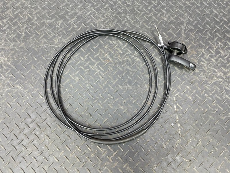 Трос лючка топливного бака