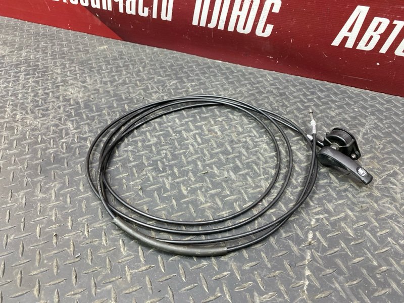 Трос лючка топливного бака