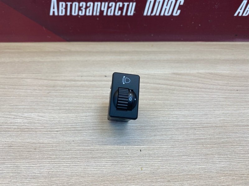 Кнопка корректора фар